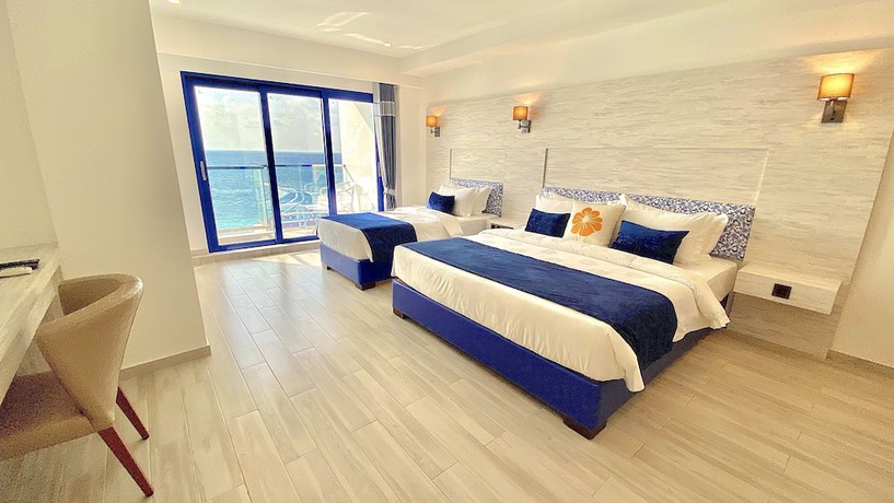 Imagen de la habitación del Hotel Kaani Palm Beach. Foto 14