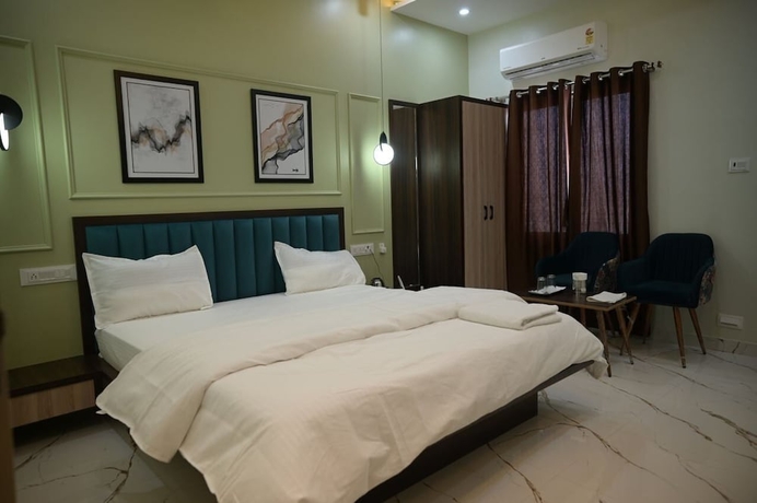 Imagen de la habitación del Hotel Kaanjee. Foto 11