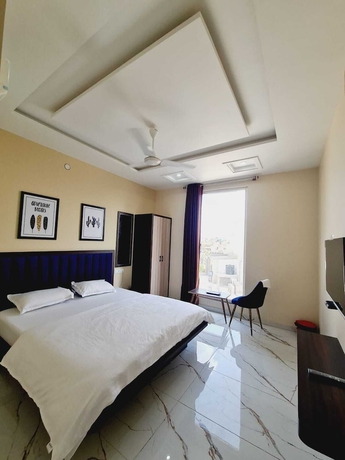 Imagen de la habitación del Hotel Kaanjee. Foto 13