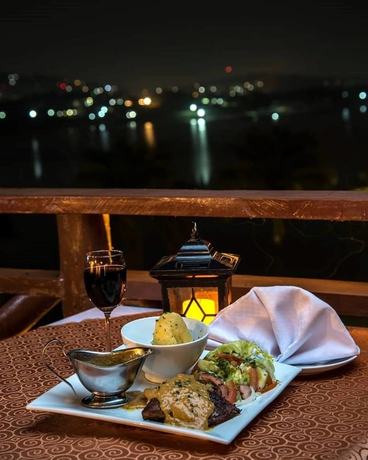 Imagen del bar/restaurante del Hotel Kaazi Beach Resort, Buggu. Foto 10