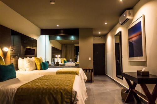 Imagen de la habitación del Hotel Kabah Boutique. Foto 8