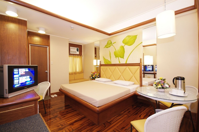 Imagen de la habitación del Hotel Kabayan. Foto 8