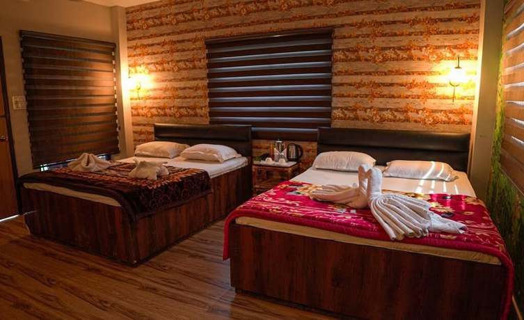 Imagen de la habitación del Hotel Kadambini Jungle Resort. Foto 18