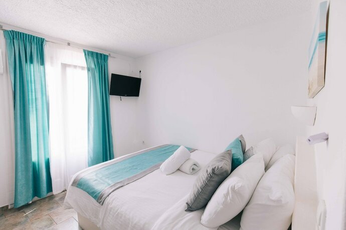 Imagen de la habitación del Hotel Kafieris View - Adults Only. Foto 15