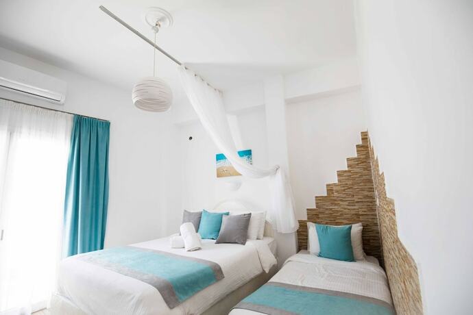 Imagen de la habitación del Hotel Kafieris View - Adults Only. Foto 19
