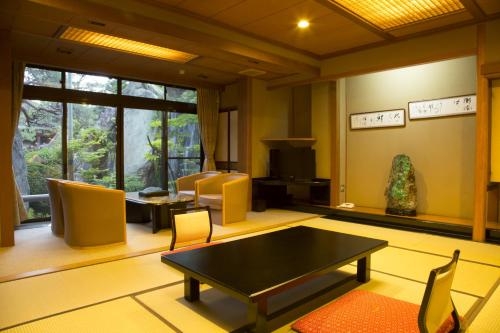 Imagen de la habitación del Hotel Kagetsu. Foto 6