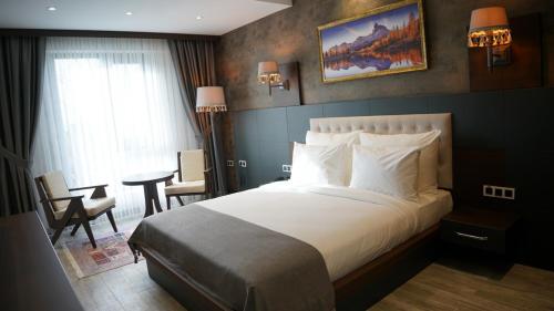 Imagen de la habitación del Hotel Kahra Otel. Foto 18