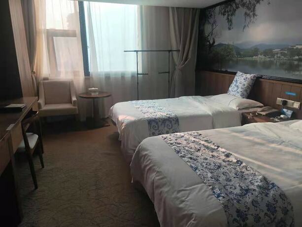 Imagen de la habitación del Hotel Kai Bin International. Foto 7