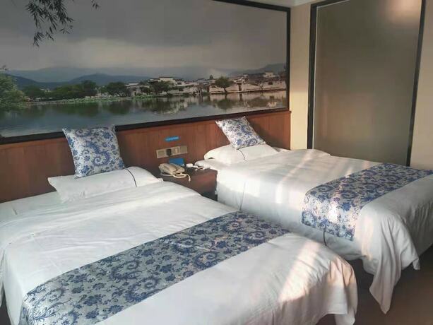 Imagen de la habitación del Hotel Kai Bin International. Foto 11