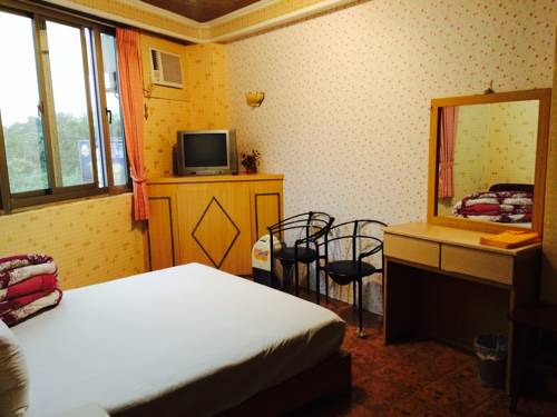 Imagen de la habitación del Hotel Kai Cheng Inn. Foto 2