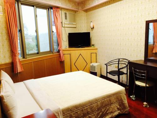 Imagen de la habitación del Hotel Kai Cheng Inn. Foto 3