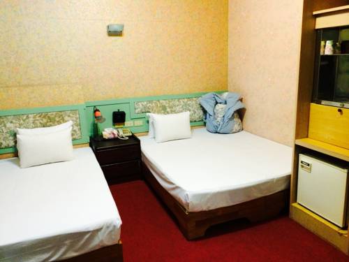 Imagen de la habitación del Hotel Kai Cheng Inn. Foto 6