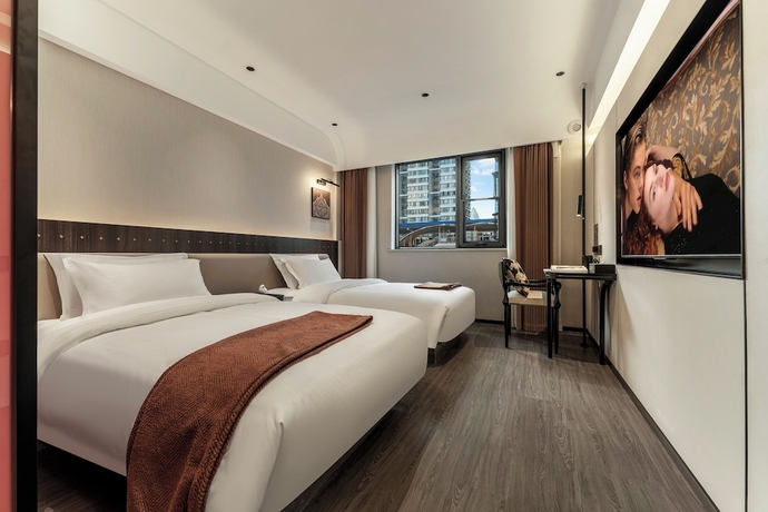 Imagen de la habitación del Hotel Kai Li. Foto 7
