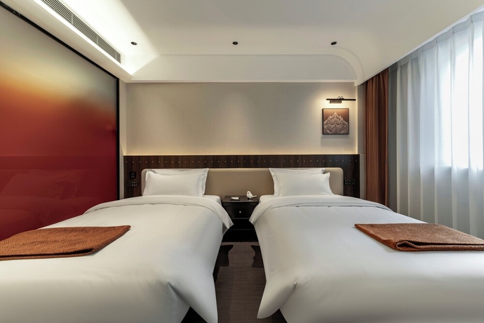 Imagen de la habitación del Hotel Kai Li. Foto 8