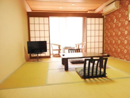 Imagen de la habitación del Hotel Kai Resort, Fuefuki. Foto 7