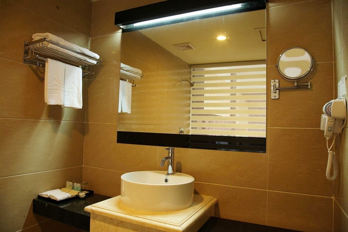Imagen de la habitación del Hotel Kai Rong Du International. Foto 4