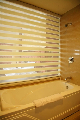 Imagen de la habitación del Hotel Kai Rong Du International. Foto 10