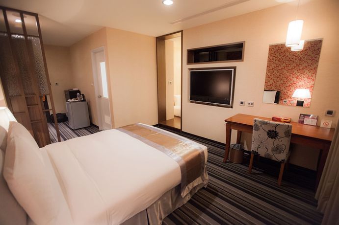Imagen de la habitación del Hotel Kai Shen Sinsu. Foto 3
