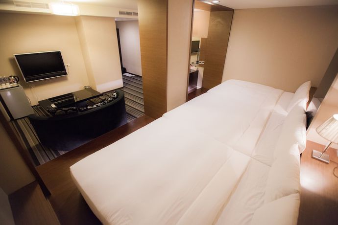 Imagen de la habitación del Hotel Kai Shen Sinsu. Foto 13