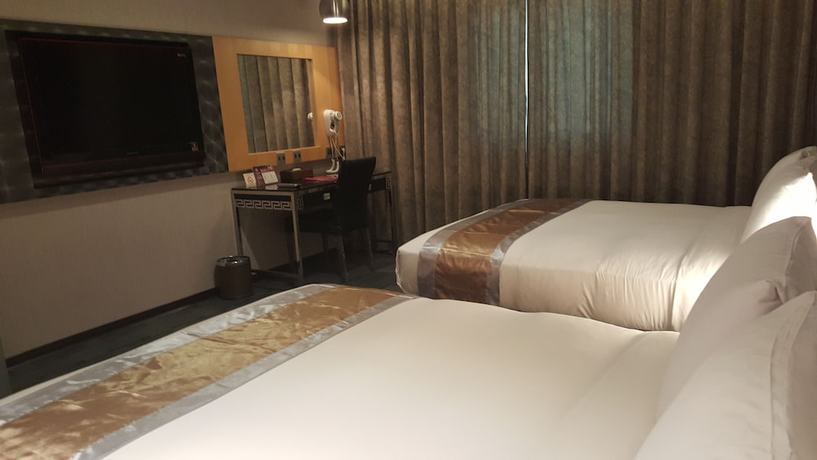 Imagen de la habitación del Hotel Kai Shen Sinsu. Foto 14