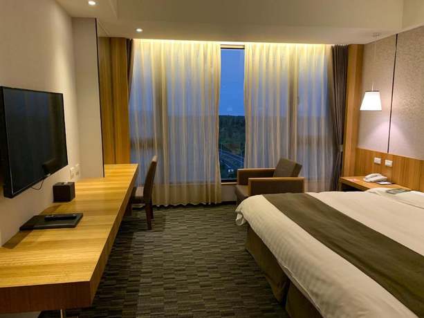 Imagen de la habitación del Hotel Kai Shen Starlight. Foto 17