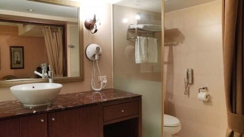Imagen de la habitación del Hotel Kai Wei Boutique. Foto 13
