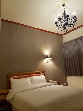 Imagen de la habitación del Hotel Kai Xin. Foto 9