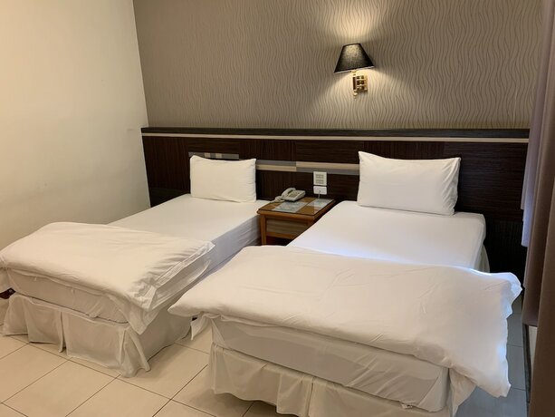Imagen de la habitación del Hotel Kai Xin. Foto 13