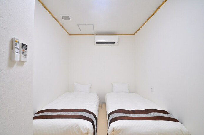 Imagen de la habitación del Hotel Kaiho Fusaki Annex. Foto 22