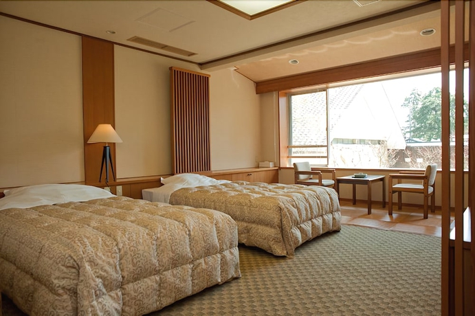 Imagen de la habitación del Hotel Kaike Onsen Tokoen. Foto 18