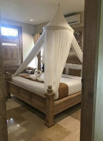 Imagen de la habitación del Hotel Kailash Bali. Foto 26