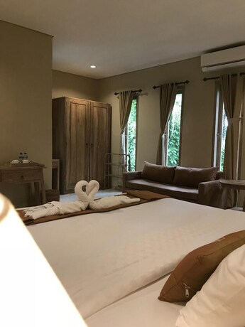 Imagen de la habitación del Hotel Kailash Bali. Foto 36