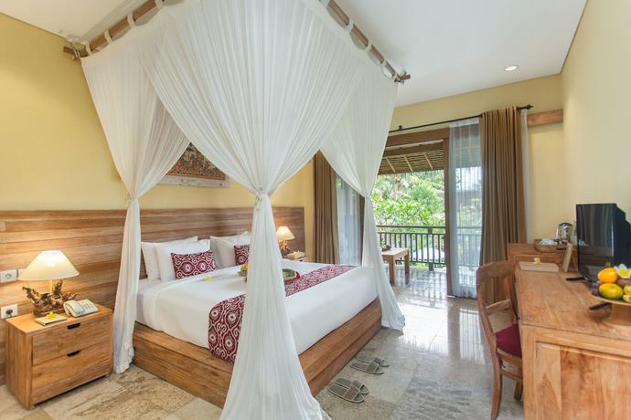 Imagen de la habitación del Hotel Kailash Suites Ubud. Foto 6