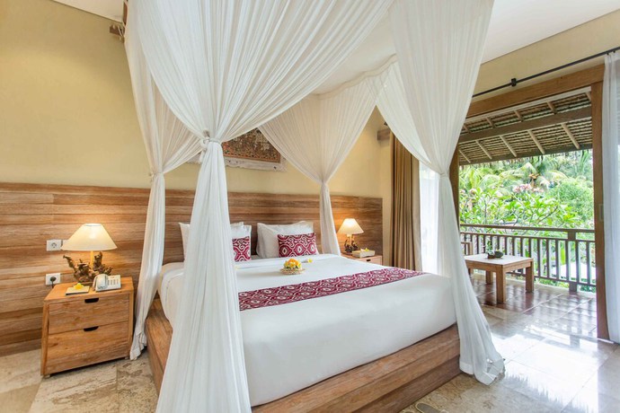 Imagen de la habitación del Hotel Kailash Suites Ubud. Foto 7