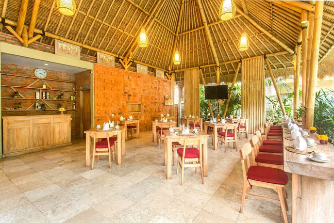 Imagen del bar/restaurante del Hotel Kailash Suites Ubud. Foto 2