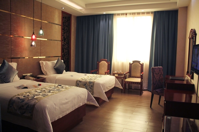 Imagen de la habitación del Hotel Kailong International. Foto 7