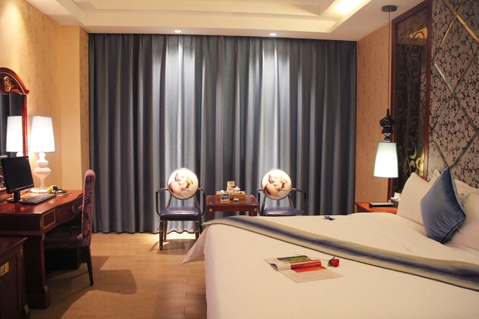 Imagen de la habitación del Hotel Kailong International. Foto 12
