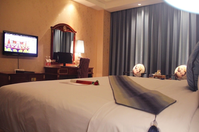 Imagen de la habitación del Hotel Kailong International. Foto 13