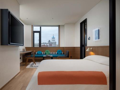 Imagen de la habitación del Hotel Kaipuu Belfry. Foto 10