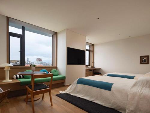 Imagen de la habitación del Hotel Kaipuu Belfry. Foto 11