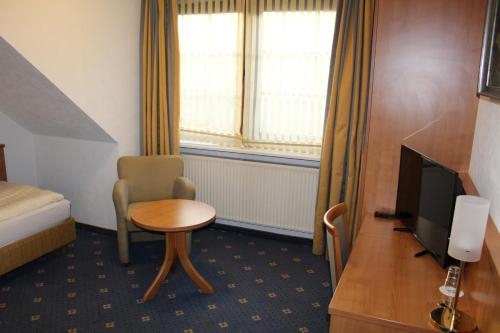 Imagen de la habitación del Hotel Kaiserhof, Lehrte. Foto 7