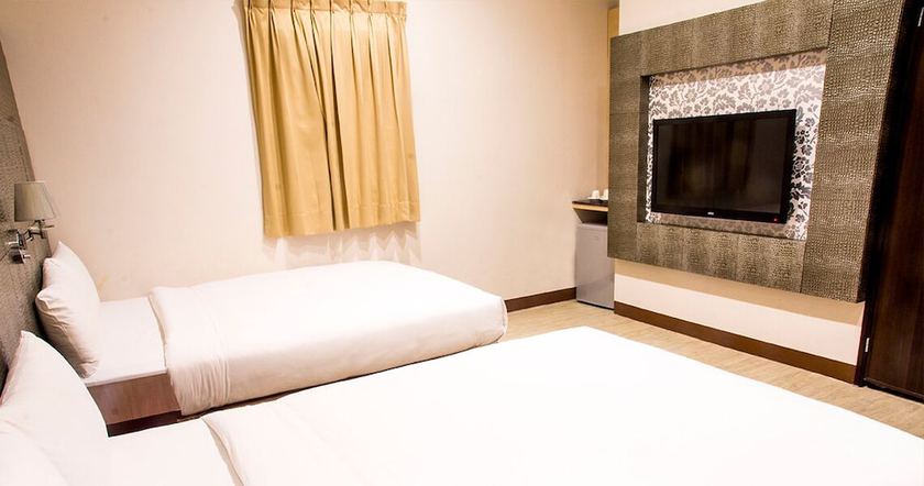 Imagen de la habitación del Hotel Kaishen. Foto 16