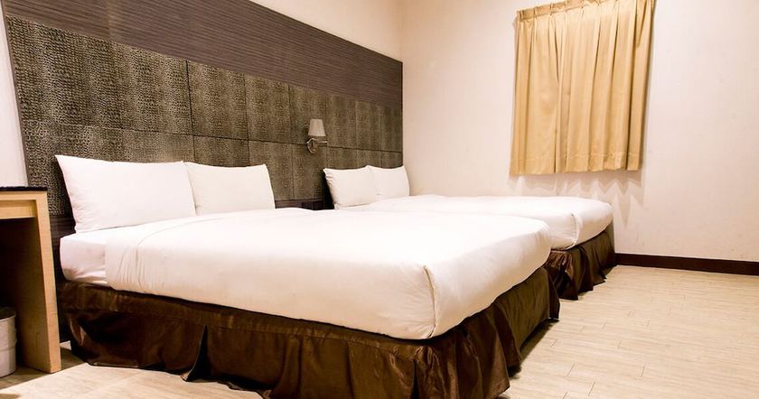 Imagen de la habitación del Hotel Kaishen. Foto 17