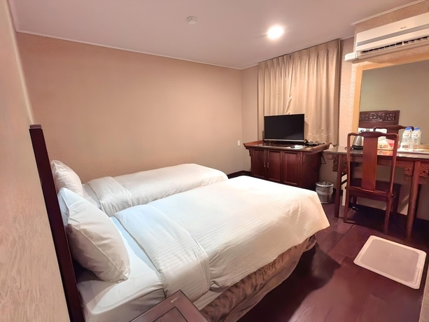 Imagen de la habitación del Hotel Kaiyue Inn. Foto 4