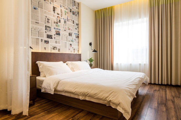 Imagen de la habitación del Hotel KaiyueHostel. Foto 4