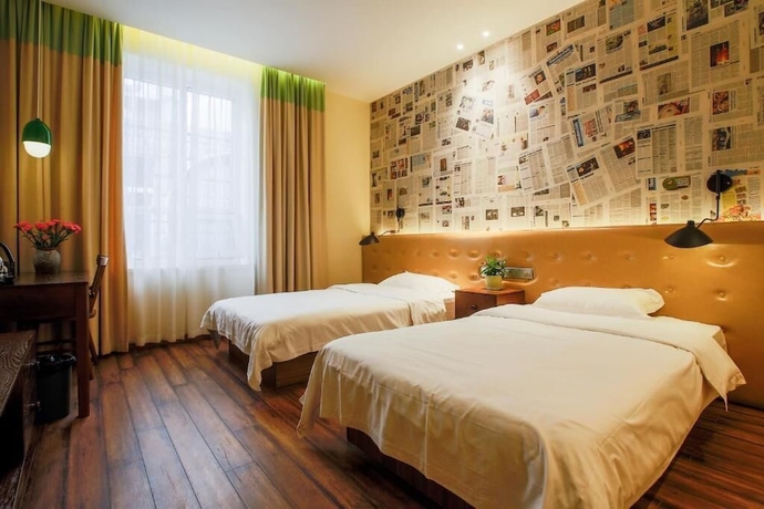 Imagen de la habitación del Hotel KaiyueHostel. Foto 8