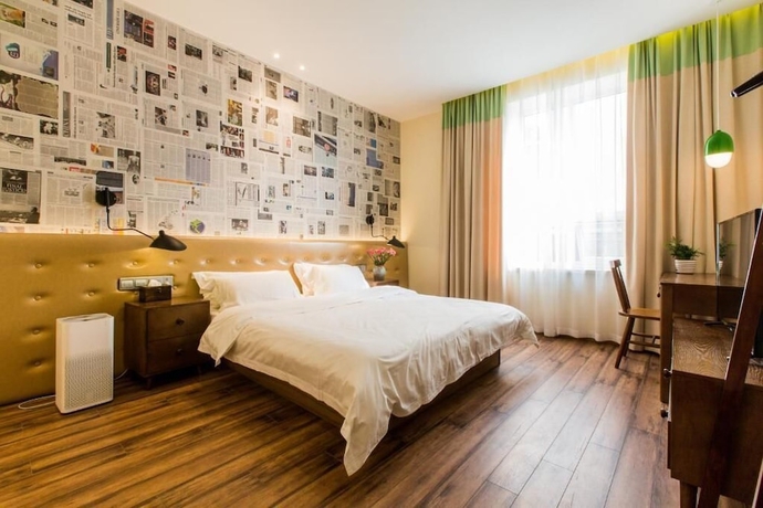 Imagen de la habitación del Hotel KaiyueHostel. Foto 10