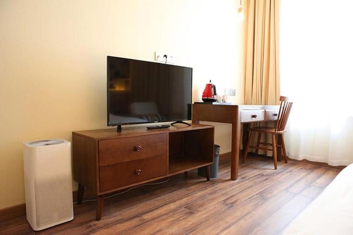 Imagen de la habitación del Hotel KaiyueHostel. Foto 11