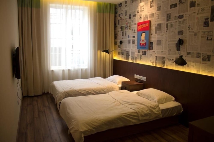 Imagen de la habitación del Hotel KaiyueHostel. Foto 13