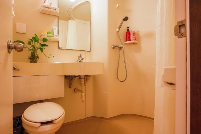 Imagen de la habitación del Hotel KaiyueHostel. Foto 17
